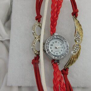 Ladies Crystal Wing Infinity Leather Weave Band Wristwatch